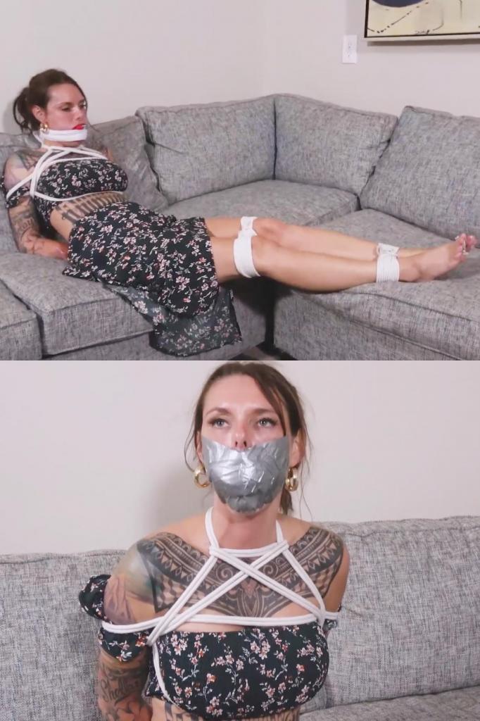 Parker Skyes - Punished for Telling Secret 帕克的男朋友看到一个朋友的帖子，嘲笑他至今还留着小时候的毯子。只有他的父母和帕克知道这个秘密。帕克否认了这一点，但他知道是她泄露了秘密，他需要给她一个教训。他绑住了她的手腕、胸部、膝盖、脚踝和脚趾（屏幕外完成），然后开始堵住她的大嘴巴。首先，她被塞上了第一个口塞，两只隐形袜子塞在她的嘴里，一条白布绑在她的嘴唇之间。他摸索着并搔着帕克，然后让她挣扎和捂住嘴。她的男朋友认为需要不止一个口塞来确保她将来保守秘密，所以他很快又回来用两条手帕堵住她的嘴，并在她的嘴唇上贴上 6 条银色胶带。Parker’s boyfriend sees a post from a friend mocking him for still with his blanky from when he was young. Only his parents and Parker know that secret. Parker denies it but he knows she’s the one who blabbed about it and he needs to teach her a lesson. He ties her wrists, chest, knees, ankles, and toes (done off-screen) and then gets to shutting her big mouth. First, her first gag, 2 no-show socks are stuffed in her mouth and a white cloth is tied between her lips. He gropes and tickles Parker and then leaves her to struggle and muffle. Her boyfriend thinks more than one gag is required to ensure she keeps secrets in the future, so he soon returns to pack her mouth with 2 hankies and plaster 6 strips of silver duct tape over her lips.
