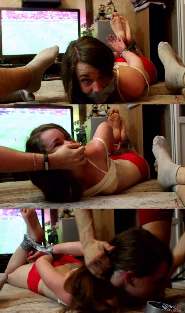 What to do if your girlfriend is stopping to watch EURO 2016 (FULL HD MP4) Category Bondage <br>Related Categories Barefoot,  Tape Bondage <br>Keywords Lada, Bound, Hogtied, Naughty Girl, Taped<br><br>Name - Lada<br>Nation - Russian<br>Age - 22 y.o.<br>Height - 162 cm.<br><br>Guys, imagine the following situation. You and your friend took a and decided to watch the game of Euro 2016 (soccer). So you sat down on the sofa and the match is in full swing when suddenly your girlfriend, deprived of attention because of football and much jealous of you to it, decides to stop you standing between you and the TV, twerking with her elastic ass... That's sexy of course, but here in Russia the soccer for the men is sacred. Naturally you want to remove annoying beauty of the screen, but how? We have the solution! This video - tutorial how to combine two nice things you love - football and bondage.<br>Lada decided to stop us with a friend to watch football... I suffered until the last, and then got up and tied her what was on hand - duct tape in hogtied and placed her next to the screen. So we have an exciting TV broadcasts, and taped girl lies next to us. TV show and bound girl look amazing together. And the main thing - she doesn't interfere you with watching TV. A good way, isn't it?<br>Enjoy!