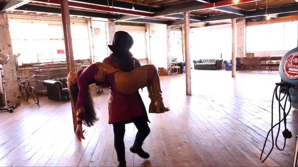Pulled Back In our SuperHeroine Lady X arrives to protect a key witness, but is ambushed by Acolyte. Despite her initial success in the fight, a dart weakens her, and Acolyte unleashes a new weapon, disrupting her equilibrium. Dizzy and disoriented, Lady X struggles to regain control as Acolyte delivers brutal attacks.