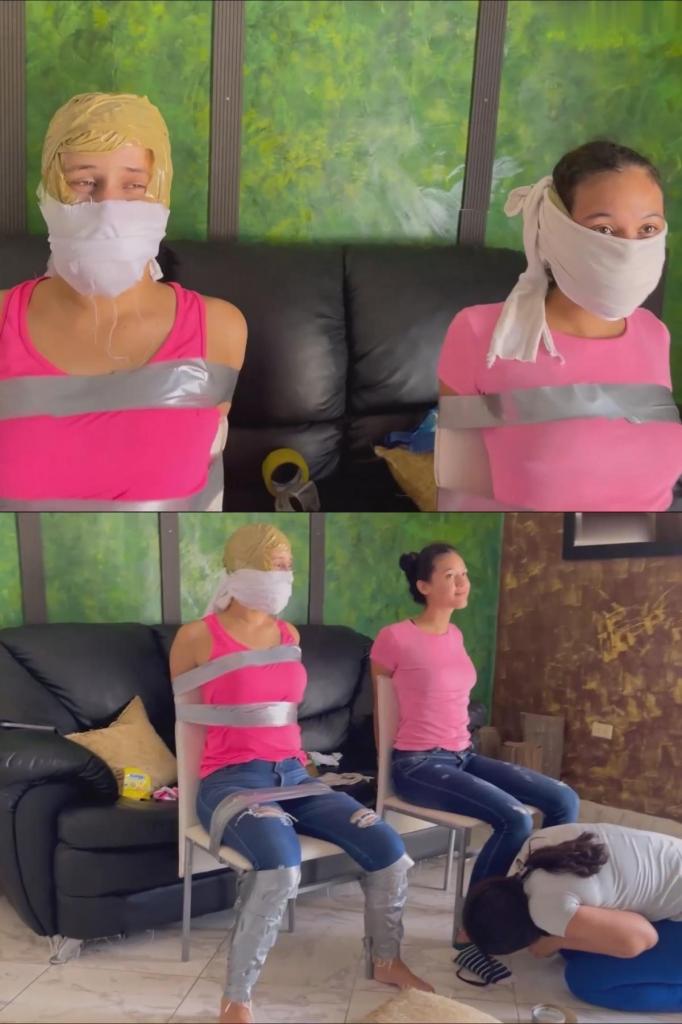 Khloe and Yurca's Ultimate Bondage Gagging Challenge - Duct Tape, OTM &amp; OTN Gags, and Restr Khloe and Yurca's Ultimate Bondage Gagging Challenge - Duct Tape, OTM & OTN Gags, and Restraint Play with Mary (mp4)在这个激动人心的捆绑视频中，科勒和尤卡接受了一项惊心动魄的挑战，看看谁能承受最大的口塞。尤卡自信地声称，由于她的嘴更大，她可以承受更大的口塞，而科勒则声称她可以承受任何数量的胶带。为了测试她们的极限，尤卡邀请了玛丽·马卡亚过来，她带着一个装满堵嘴用品的袋子，包括多卷胶带和各种堵嘴用的布。<br><br>场景一开始，科勒被牢牢地绑在椅子上，她的胳膊被绑在身后，脚踝被紧紧地缠在椅子腿上。玛丽和尤卡合作，用袜子塞住科勒的嘴，然后玛丽用多层胶带缠住她的嘴——总共缠了 12 层。当科勒被彻底捆绑和堵住嘴时，尤卡和玛丽确保收紧束缚，加上更多层胶带将她的上半身和腿固定在椅子上。<br><br>科勒被完全固定住后，这对爱玩的二人组用食物逗弄她，试图喂她，尽管她嘴里塞着东西。经过几分钟的调侃，轮到尤尔卡被堵住嘴并绑住。玛丽用袜子塞住尤尔卡的嘴，用几个 OTM（口上）口塞和多层胶带将她固定住。尤尔卡被绑在椅子上，她受到了与科勒相同的待遇，她的嘴被用胶带紧紧包裹，包括一个巨大的 OTN（鼻上）口塞，以保持她的安静。但她的口塞后来被重新制作成内裤口塞和紧密缠绕的胶带口塞，外面绑着多条 OTM/OTN 布。<br><br>视频中充满了欢笑和嬉戏互动的时刻，两个女孩现在被重重地堵住嘴并紧紧绑住，试图通过她们的口塞进行交流，每个女孩都在测试自己约束和口塞的极限。当玛丽一边吃零食一边戏弄科勒和尤卡时，她确保她们被牢牢绑住，无法说话，让她们一起享受挑战。<br><br>这段捆绑视频重点介绍了复杂的堵嘴技术、紧密的捆绑和参与者之间的有趣互动。看着女孩们用多层胶带和布料挑战自己的极限，创造出一种强烈而有趣的堵嘴体验，捆绑和束缚的粉丝们会喜欢的。In this exciting bondage video, Khloe and Yurca take on a thrilling challenge to see who can handle the biggest gag. Yurca confidently claims she can handle a larger gag due to her bigger mouth, while Khloe asserts she can withstand any amount of duct tape. To test their limits, Yurca has invited Mary Macaya over, who arrives with a bag full of gagging supplies, including multiple rolls of tape and cloths for a variety of gags.<br><br>The scene starts with Khloe being securely taped to a chair, her arms bound behind her and her ankles tightly wrapped to the legs of the chair. Mary and Yurca work together, gagging Khloe with socks stuffed into her mouth before Mary wraps her mouth with multiple layers of duct tape—12 wraps in total. As Khloe is thoroughly bound and gagged, Yurca and Mary make sure to tighten the restraints, adding even more layers of tape to secure her upper body and legs to the chair.<br><br>Once Khloe is completely secured, the playful duo teases her with food, attempting to feed her despite her gag. After several minutes of playful taunting, it's Yurca's turn to be gagged and bound. Mary stuffs Yurca's mouth with socks, securing her with several OTM (over-the-mouth) gags and layers of tape. As Yurca is bound to the chair, she receives the same treatment as Khloe, with her mouth packed and wrapped tightly with tape, including a massive OTN (over-the-nose) gag to keep her quiet. But her gag is later re-made with a panty gag and a tight wraparound tapegag with multiple OTM/OTN cloths tied outside.<br><br>The video is filled with moments of laughter and playful interaction as the two girls, now heavily gagged and tightly bound, attempt to communicate through their gags, each girl testing the limits of her restraint and gag. As Mary eats snacks and teases both Khloe and Yurca, she makes sure they are securely bound and unable to speak, leaving the two to enjoy the challenge together.<br><br>This bondage video highlights intricate gagging techniques, tight bondage, and playful interaction among the participants. Watch as the girls push their limits with multiple layers of tape and cloth, creating an intense and fun gagging experience that fans of bondage and restraint will enjoy.<br>