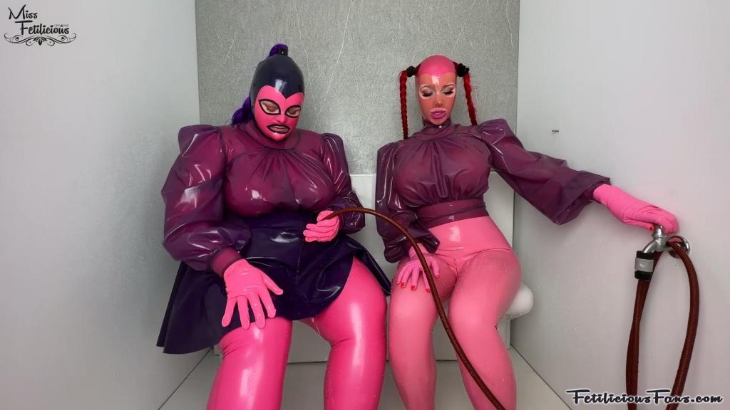  Pink and purple latex layers Two cute rubberdolls having fun in full latex.<br>We love wearing multiple layers of latex. The more layers the more rubbery sounds. ????<br>My friend Fluffy Queenie has the exact same blouse as me. So we knew we had to shoot this togetger! ????<br>Playing with the cold water was actually very refreshing because we were so warm inside all that latex.