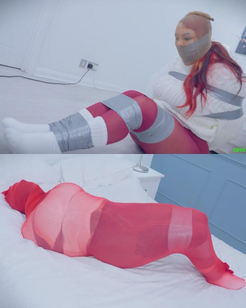 Rara's Pantyhose Nightmare: Captured and Encased ( duct tape, tied up, restrained, silenced, ma Rara's Pantyhose Nightmare: Captured and Encased ( duct tape, tied up, restrained, silenced, massive duct tape wrap gag, stocking, red bodystocking, encased, bondage, gagged, muffled )拉拉刚穿上袜子，查看手机，就看到了一个令人震惊的消息：一个穿连裤袜的窃贼正在恐吓社区。突然，她被人从后面抓住，措手不及，无助无助。她用胶带把手腕和脚踝紧紧绑住。<br>为了让她停止尖叫，用胶带缠住她的嘴，使她无法发出求救的声音。拉拉挣扎着，眼睛睁得大大的，满是恐惧，她试图挣脱紧紧的束缚。但胶带牢牢地绑住了她。<br>然后，她的头被套在长袜里，又增加了一层束缚，进一步抑制了她的哭声。她几乎看不透薄薄的材料，这加剧了她的迷失方向和恐慌。她挣扎得更厉害了，但长袜只会让她更难呼吸和呼救。<br>最后，一件红色的连身衣盖住了她的整个身体，把她完全包裹住了。紧身衣包裹着她的皮肤，使她无法自由活动。拉拉无助地躺在床上，身体被捆绑和堵住嘴，她的声音被压抑和沉默。红色连体衣将她完全包裹住，让她徒劳地挣扎和扭动，她的尖叫和恳求被层层衣服压抑。Rara is just getting her socks on, checking her phone, when she sees the alarming news: a pantyhose burglar has been terrorizing the neighborhood. Suddenly, she's grabbed from behind, caught off guard and helpless. Duct tape is used to bind her wrists and ankles tightly.<br>To silence her screams, a massive duct tape wrap gag is applied, muffling her pleas for help. Rara struggles, her eyes wide with fear as she tries to break free from the tight restraints. But the duct tape holds strong, keeping her captive.<br>Her head is then encased in a stocking, adding another layer of constriction and muffling her cries even further. She can barely see through the thin material, adding to her disorientation and panic. Her struggles intensify, but the stocking only makes it harder for her to breathe and call out for help.<br>Finally, a red bodystocking is pulled over her entire body, completely encasing her. The tight material stretches across her skin, making it impossible for her to move freely. Rara is left helpless on the bed, her body bound and gagged, her voice muffled and silenced. The red bodystocking ensures her complete and utter encasement, leaving her to struggle and wriggle in vain, her screams and pleas muffled under the layers of material.