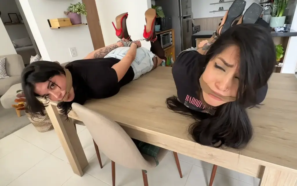 You Caught 2 Pantyhosed Thieves 片名：You Caught 2 Pantyhosed Thieves (Ripped Nylons, Jean Shorts, High Heels, RolePlay, Handcuffs, HogCuffed, Pantyhose Stuffing & CleaveGag)<br>From：KinkyLifestyle<br>（高清丝袜堵嘴新片更新，双人女女丝袜堵嘴片。虽然时间不长但干货满满，风格清新，两个丝袜美女（肉色丝袜和黑色中筒袜），两人被驷马捆绑挣扎，丝袜堵嘴 丝袜勒嘴。透过凉鞋可以看到两人丝袜脚。）<br>You Caught 2 Pantyhosed Thieves<br>(Ripped Nylons, Jean Shorts, High Heels, RolePlay, Handcuffs, HogCuffed, Pantyhose Stuffing & CleaveGag)<br>Simona & Mara are two masked thieves who managed to break into your home. They think they're safe so they take off their masks and start looking for goods to take. Simona finds a picture of you and thinks you're so handsome she wants to keep you. Mara starts asking what is Simona up to but she won't tell.<br>You get home so they hide, you notice the bag and go into the bathroom to make them think you left. They go out and Simona tells Mara to leave but she doesn't want to so they start fighting and you go out to get the<br>Next we see is both girl hogcuffed so you stuff some pantyhose into their mouths to let them struggle for a while to then put a pantyhose cleavage on them to struggle until the end so they learn they lesson.<br>
