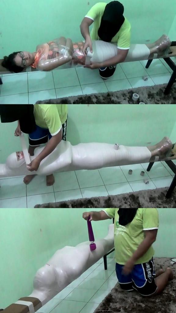 [POV] Main Scene Of RandyMummify RM097 A beautiful girl is wrapped into a mummy with white duct tape on a large stick.<br>However due to shortness of breath, the scene could not be continued any further