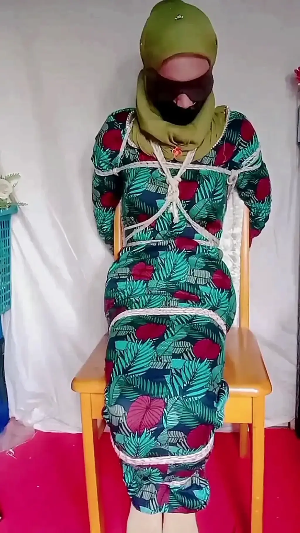 Tied to a Chair in Batik Clothes Tied on a chair with batik clothes and a few moments later tied with hands tied up