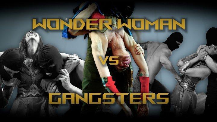 Wonder Woman Vs Gangsters 两个歹徒敢于挑战神奇女侠，在强大的血清的推动下，他们势不可挡。一开始，亚马逊很容易就控制了战斗，用她高超的技能和力量把他们甩来甩去。但是血清开始起作用了——他们的力量越来越强大，很快局面发生了逆转。神奇女侠挣扎着，被压倒了，被打败了，直到她完全被打败，任凭他们摆布。<br>Two gangsters dare to challenge Wonder Woman, boosted with a powerful serum that makes them unstoppable. At first, the Amazon easily dominates the fight, tossing them around with her superior skills and strength. But the serum begins to take effect — their power grows, and soon the tables turn. Wonder Woman struggles, overpowered and outmatched, until she is completely defeated and left at their mercy.