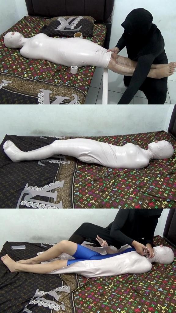 [POV] Main Scene Of RandyMummify RM135 A beautiful and still innocent girl is invited to perform a mummification scene for the first time. This girl's body was wrapped so tightly that it was helpless to look very sexy. Not long after, this girl struggled to ask to be released.