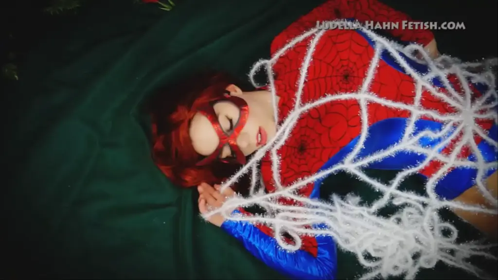 Spider Hahn Trapped in a Web - Villain uses Robotic Spiders to Capture his Big Booty Prey - WMV 720p our superheroine spier hahn trapped in a villain's web.........