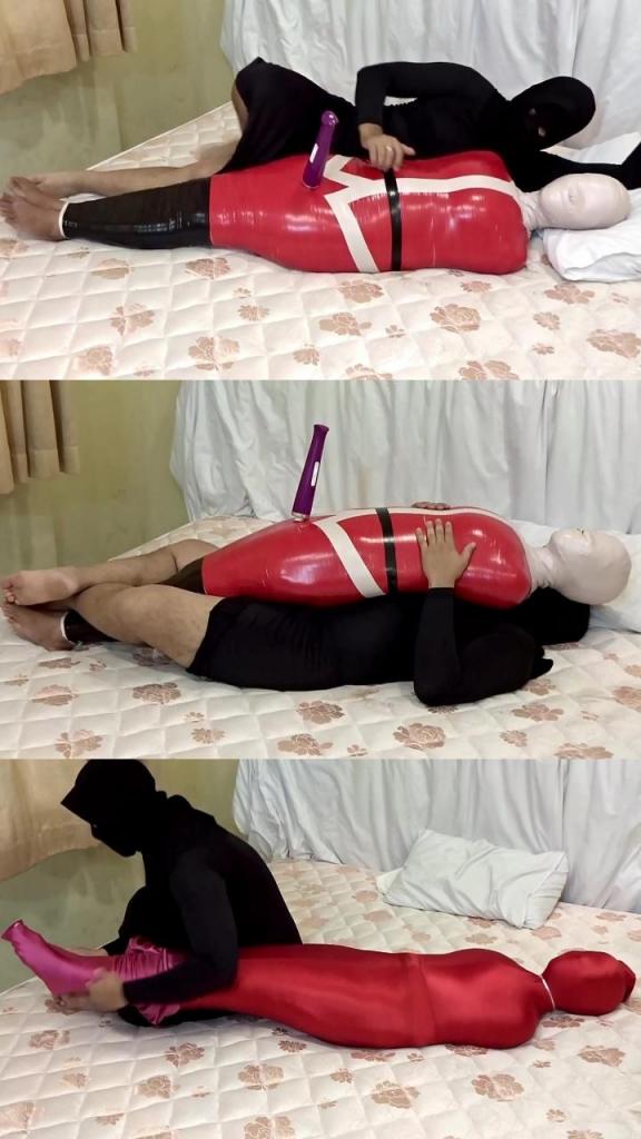 [POV] Main Scene Of RandyMummify RM144 A girl was mummified using 2 colors of duct tape, namely white and red duct tape. This girl's body is wrapped helplessly on a Christmas theme on Christmas Eve. The girl is then toyed with with a dildo, raised high, standing up to add 1 layer of legings.9