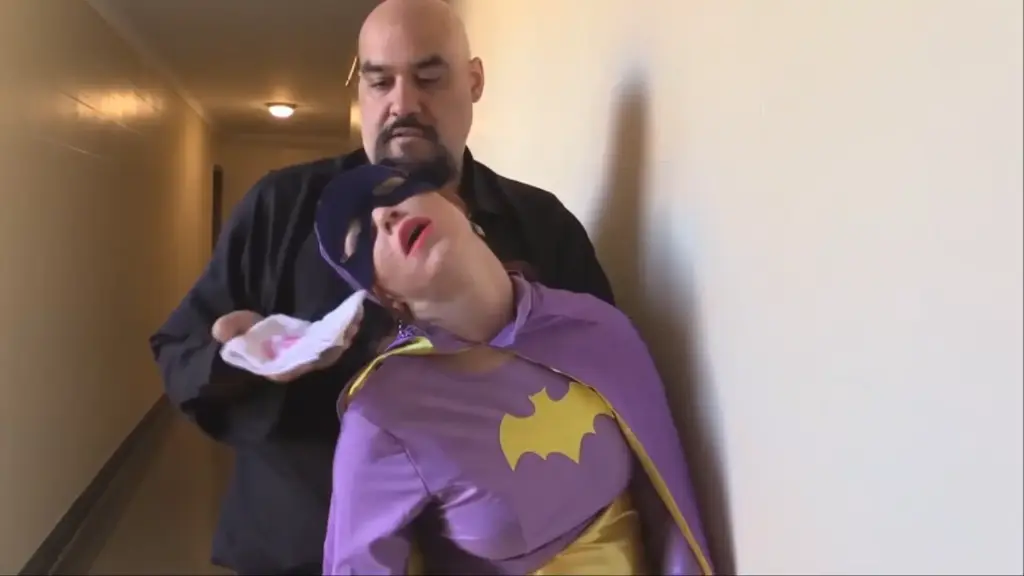 Batgirl is a wax mannequin our superheroine Batgirl is on patrol when she encounters a man who obviously sounds like he has had some developmental issues