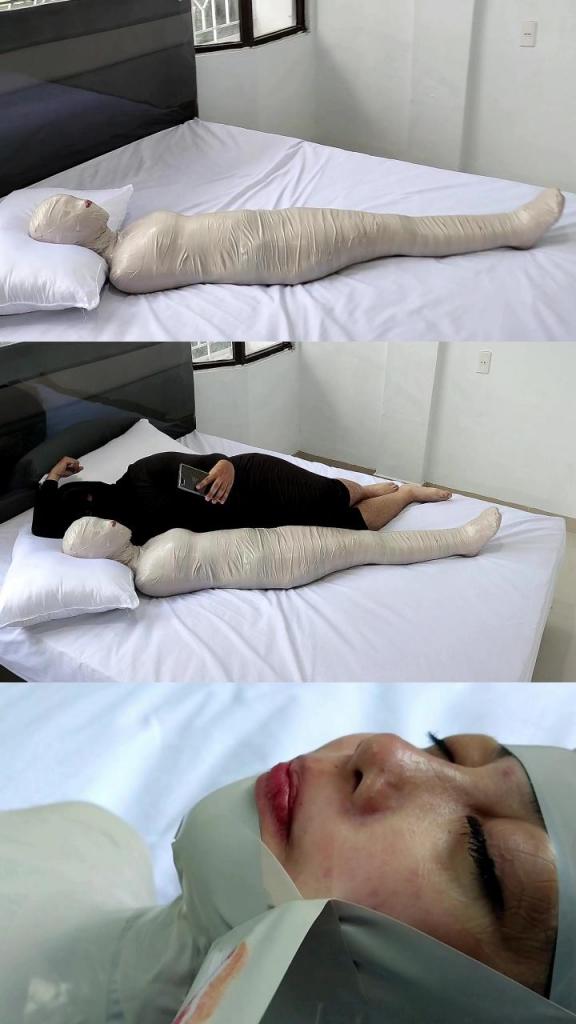 [POV] Main Scene Of RandyMummify RM156 This Beautiful Girl Wearing a Pink Swimsuit is Wrapped Up with Saran Wrap Plus Wrapped in Tight Pink Spandex then her body is lifted and played with