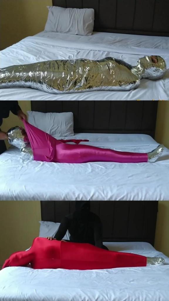 [POV] Main Scene Of RandyMummify RM165 A Newly Known Girl Of Pakistani Descent Offered Her First Try To Become A Mummy With Chrome Duct Tape. After being helpless, this girl's body was wrapped again in two layers of leggings so that the girl's waist felt very tight.