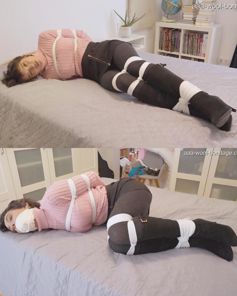 PIXIE IN TIGHTS AND SWEATER BOUND AND TAPEGAGGED 这个女孩被绳子捆绑着，她希望被绑住嘴巴的时间越长越好。海伦娜主动要求被绑起来，体验被别人掌控的感觉。她穿着靴子、裙子、紧身裤和高领毛衣，在床上翻滚，被绳子捆绑着，嘴巴也被胶带封住，她的魅力显而易见。海伦娜喜欢被捆绑，也喜欢被堵住嘴巴。All roped up, this girl wanted to be bound and gagged as long as possible. Helena asks to be tied up, to experience the idea of someone else being in control. In boots, skirt, tights and turtleneck sweater, Helena's charms are clear, as she rolls around on a bed, roped up and tape-gagged. Helena LOVES to be tied up. And she loves to be gagged, too.