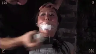 Young sexy asian bound in cellar part 2 Idon't know how long i'm his captive. He tortures me badly. Muffled with my panty stuffed in my mouth he forced me with dildos. I have to deepthroat his dildo stick gagged with a spreader gag. Then comes breathplay, tape gagged with a cigarette in my nostril. This guy is crazy ! Bondage extreme, sneackers, socks, panty gag, tape gag, spreader gag, torture, dildo fucking, breathplay, cute face, screaming, handcuffed, chairtied, drooling, teasing tongue