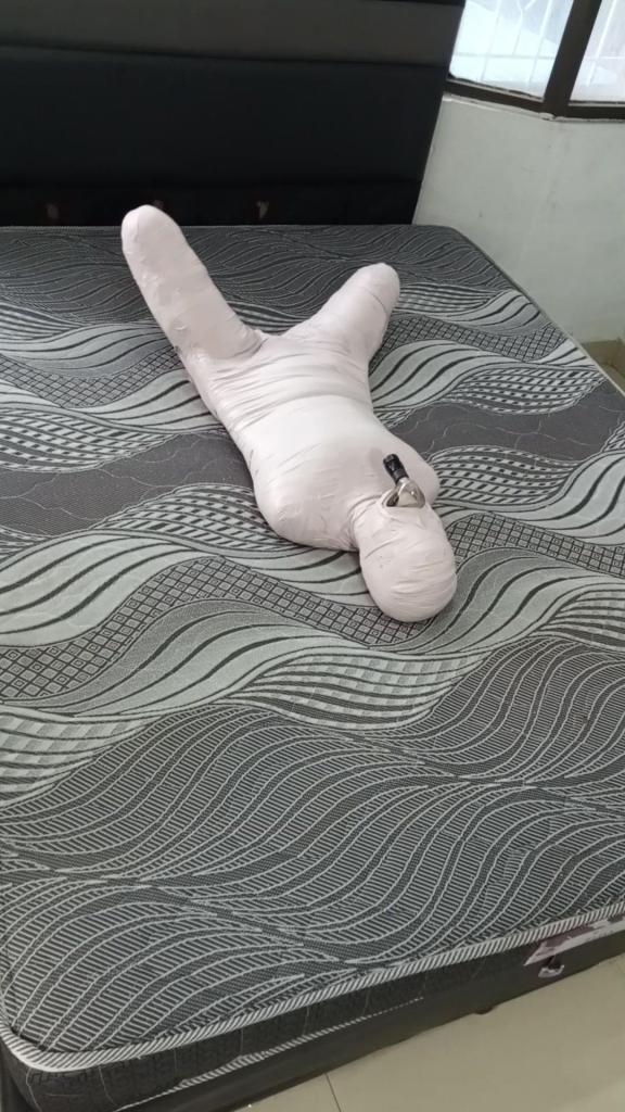 [POV] Main Scene Of RandyMummify RM168 This Girl Is Wrapped Tightly With White Duct Tape In A Unique And Extreme Pose Where Her Hands Are Wrapped Together With Her Thighs And Her Breath Is Restricted With A Mask. This Girl Feels Very Tortured And Her Blood Circulation Is Disturbed To The Point Of Making Her Hands Numb.