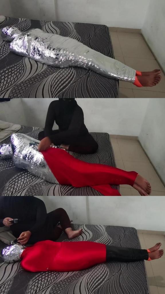 [POV] Main Scene Of RandyMummify RM169 A Pakistani girl was wrapped tightly with black plastic wrap and then covered again with chrome tape. The helpless body of the hadith was then put on tight leggings. After being completely helpless, when she was about to be covered with black tape, the slave experienced shortness of breath so that the scene immediately entered the restriction of breathing until this girl cried in resignation.