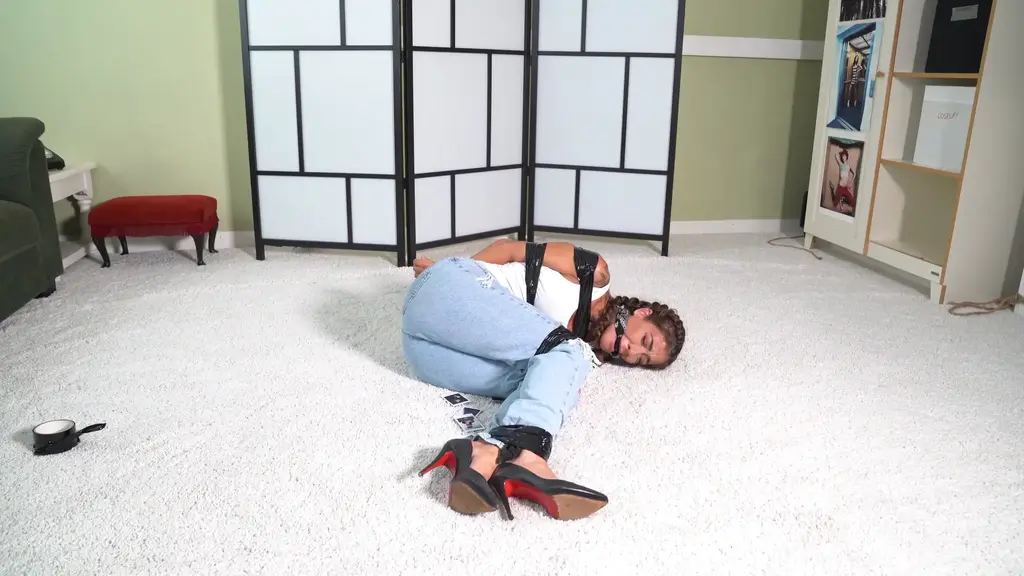 3181 Gemma and Veronika in GRABBER pt 1 Tape Tie Gemma gets home and finds some strange photos on the floor of women tied up!<br><br>Suddenly she is GRABBED. She gets taped up by Veronika and Veronika takes photos of Gemma as she tries to escape.<br>
