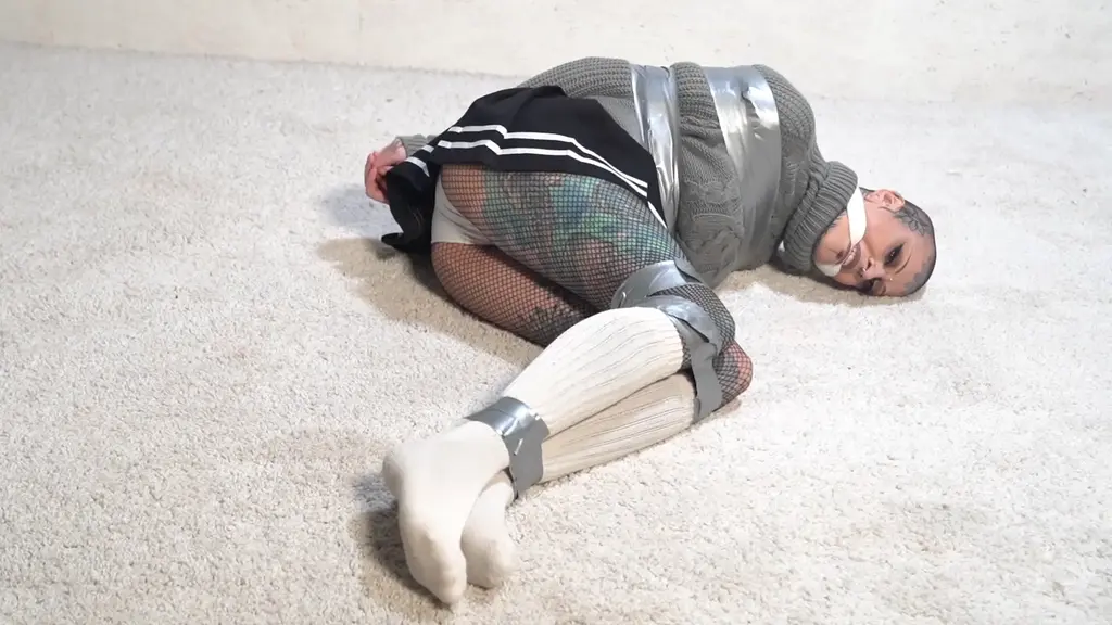 4020 Lexi in Cheerleader Tape Takedown What does OCTOBER mean to you? Halloween? yeah sure, but what does THAT mean? ah! Spooky things, ghoulish things.... and CHEERLEADERS in TROUBLE?? YAY!!<br><br>Lexi is a cheerleader. She gets taped up and gagged!