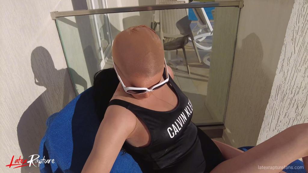 ????NYLON????Encasement by the pool Oh, how I love my nylon skin. My entire body covered in sheer, shiny nylon. Almost invisible except for the strong shine and slight distortion of my face. I love presenting myself like this in public. Lust covers my body. The warm holiday breeze caresses my shiny body. Sunbathing just the how I like it.