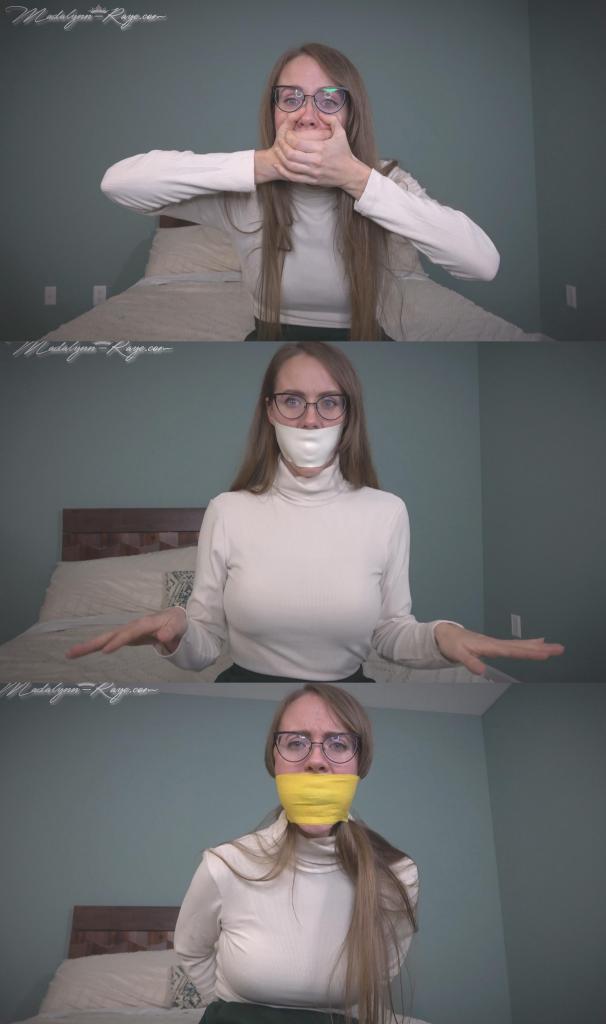 Madalynn finds out just how much you LOVE gag talk! GagTalk, GaggedWomen, TapeGag, PantyGag, Bandana Madalynn finds out just how much you LOVE gag talk! GagTalk, GaggedWomen, TapeGag, PantyGag, BandanaGag, MouthStuffing, HandOverMouth玛德琳沮丧地走了进来，语无伦次地抱怨她最喜欢的棒球队差点就赢了，却最终输了。你告诉玛德琳她话太多，应该闭嘴。然后她开始讲这个故事，甚至一边讲一边捂住嘴，想让你知道就算捂着嘴她也停不下来。你建议也许应该把她的嘴塞满东西，但塞什么好呢？她想证明自己什么都能说，于是同意把你口袋里的手帕塞进嘴里。她继续说着，嘴里塞着手帕，含糊不清地嘟囔着，甚至用手捂住嘴，还在继续！虽然你一个字也听不懂，但她嘴里塞着东西，说话却清晰得令人印象深刻。她真的一秒钟都停不下来。她还想继续说她的感受，但你建议接下来把一条内裤塞进她嘴里。她同意了，因为她很高兴证明没有什么能让她闭嘴。她坚信自己最擅长用口塞堵嘴说话，为了向你证明这一点，她什么都愿意塞进嘴里。她又开始喋喋不休，说着只有她自己才能听懂的“语言”。你拿出一些泡沫胶带，心想这下总算能让她闭嘴了，但她却笃定胶带根本阻止不了她继续说下去。出乎你意料的是，胶带真的没让她闭嘴。相反，它反而让她说得更多了！她开始装出一副楚楚可怜的样子，一边含糊不清地嘟囔着，一边用嘴里塞着的东西说话。她问你什么时候才能把口塞拿掉，你却装作听不懂。她觉得你开始欣赏她的“口才”了，因为她注意到你好像有点儿硬了。这让你兴奋吗？这就是让你硬起来的原因？听她嘴里塞着内裤，嘴上还贴着胶带，一边用口塞堵嘴说话？她惊恐地发现你的阴茎勃起了，于是撕下胶带，脱掉内裤。她继续说道，她已经充分证明了没有什么能让她闭嘴，但你还想再试一次。你只需要答应她，如果她同意，就不要在她面前自慰。你递给她一条蓝色头巾和一条黄色医用绷带。她同意用绷带把头巾塞进嘴里，但如果你想射精，就必须能够完全不碰自己，只听她含糊不清的说话声。你觉得你能做到吗？即使嘴里塞着那么大的头巾，她一边用绷带包住头和嘴，一边还能说话。与此同时，看着她被堵住嘴的样子和她喃喃自语的声音，你的阴茎越来越硬。她被堵住嘴的样子真漂亮，不是吗？她双手背在身后，仿佛被绑住了一样，一边呻吟一边低声咕哝，让你好好欣赏。你无视她的规矩，掏出阴茎开始撸动。她大声叫喊，明显很生气，但你却不停地抚摸着勃起的阴茎，而她则拼命地想找到解开口塞的办法。就在她终于解开口塞和绷带的时候，你射了出来，她气得不行，因为你竟然在她干净的地毯上撸管。好吧，你得把这烂摊子收拾干净。你或许赢得了这场小仗，但她赢得了整场战争，因为她现在知道该如何从你身上得到她想要的东西了。Madalynn comes in upset, rambling because her favorite baseball team came so close to winning, but didn't. You tell Madalynn that she talks too much and that she should shut up. Then she starts to tell this story and even covers her mouth while doing so to show you that even with a hand over her mouth she still never shuts up. You suggest that maybe her mouth should be stuffed, but with what? She wants to show you that she can talk through anything, so she agrees to stuff the handkerchief from your pocket in her mouth. She goes on talking, mumbling through the fabric that is stuffed in her mouth and even covers her mouth with her hand and is still going! Although you can't understand a word she's saying, she's still talking impressively clear with her mouth covered and stuffed. She literally will not shut up for even one second. She wants to go on talking about her feelings, but you suggest stuffing a pair of panties in her mouth next. She agrees, because she's happy to prove that nothing can shut her up. She's convinced she's the best at gag talk and is willing to stuff anything in her mouth to prove it to you. Again, she just goes on and on, rambling in a language only she can understand. You offer some foam tape, thinking that will finally do the trick, but she's sure it won't do anything to stop her from talking. Much to your surprise, that did, in fact, not shut her up. If anything, it made her talk even more! She starts acting out some sort of damsel scene or something, pretending to be helpless while she mumbles and talks through her gag. She tries asking when she's going to be able to remove the gag, but you pretend to not be able to understand her. She assumes you're starting to appreciate her gift of gab because she noticed you kind of have a bit of a boner. Does this turn you on? This is what makes you hard? Hearing her gag talking with panties stuffed in her mouth and tape over it? Appalled that your cock is hard, she takes the tape off and the panties out. She goes on, saying how well she's proved that nothing can make her shut up, but you want to try one more. You just have to promise to not touch yourself in front of her if she agrees to it. You pass her a blue bandana and yellow vet wrap. She agrees to stuff the bandana in her mouth with the vet wrap around it, but if you want to cum you have to be able to do it hands free from just the sound of her gag talk, no touching yourself at all. Think you can do it? Even with that big bandana stuffed in her mouth she still talks through it as she wraps the yellow vet wrap around her head and over her mouth. All the while, your cock is getting harder and harder at the sight of her gagged and sounds of her mumbles. She does look so pretty gagged like that, doesn't she? She holds her hands behind her back as if she's bound while she moans and mumbles for you to enjoy. You ignore her rules and pull your cock out and start jerking it anyways. She's yelling and visibly upset, but you won't stop stroking your hard cock as she desperately tries to find the end to take the gag off. You cum right as she's finally getting the gag and wrap off and she is so upset that you just jerked off on her fresh, clean carpets. Well, you're going to have to clean this mess up. You might have won the battle, but she won the war because now she knows exactly how to get what she wants from you.