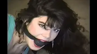 Ballgagged in submission Bimbo, leather strapped, bondage rope, harness gag, ballgag, struggling, moaning,underwear, high heels,gloves, gitana