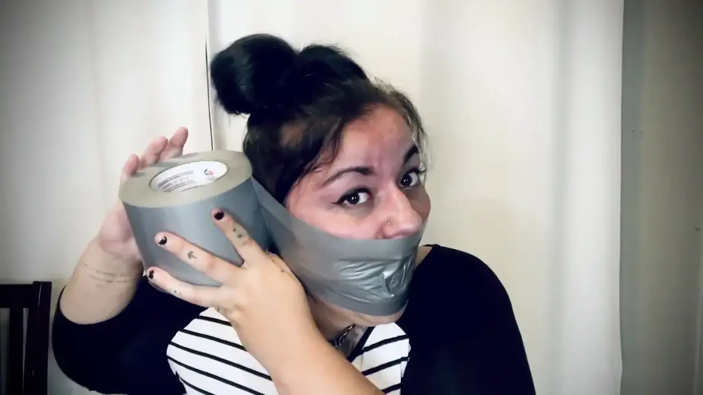 Now that’s what I call a gag 11 I try out four different gags from tape to cloth back to tape. Watch as I slowly wrap and add layer after layer stuffing my mouth with something different each time. Watch as I sensually caress each gag giving myself a slap time to time as needed...