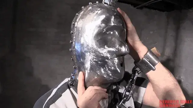 Self Bondage Electromagnets Part-8 【中文男M】TAG：头笼、电磁铁锁、自缚。视频中，我的朋友Bind用我为他制作的电磁铁和定时器盒做了一个自缚场景。让我在这里停下来，提醒大家自我束缚是极其危险的，我不建议任何人这样做。The video in this update is one of the hottest videos I have ever shot. The video features my friend Bind doing a self-bondage scene with the electromagnets and timer box I built for him. Let me stop right here and remind everyone that self-bondage is extremely dangerous, and I don't suggest that anyone do it. However, self-bondage is a great fantasy and I must admit that while I was editing this video I had to stop and jerk off.<br><br>I have been doing bondage all my life, and now that I'm 66 I look back and realize that I've missed out on a lot in life because I've been thinking about bondage, fantasizing about bondage, playing with bondage, building bondage websites and photographing bondage, and building bondage gear. Years have gone by, but the thing that keeps me going are videos like the one in this update. I have shot thousands of bondage videos, and occasionally one of the videos touches my core kink. This video is one of them.