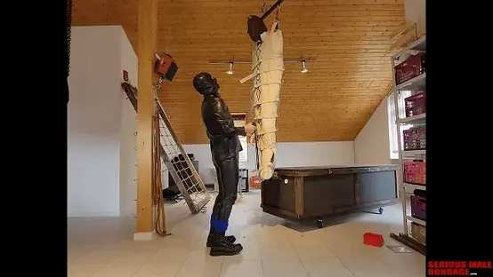 Lock-Away Box Project 木乃伊起吊后装箱。This is a fun video from our friends Yohan555 and Serwus4 in Germany. Both of these guys are on Twitter under the same names. We were going to visit Germany and Switzerland later this year, but with the spread of the Delta virus we canceled our trip. As a result, these guys sent us this video which features a 'Lock-Away Box' which they built in one weekend. Great job you guys. We look forward to visiting you in the future.<br><br>There seems to be a lot of people building isolation boxes these days. Yohan builds a lot of his own gear including a jail cell, padded cell, isolation cell, electromagnet self-bondage chair, electromagnet self-bondage coffin box, and more gear which I can't remember. Check out his Twitter photos. Yohan is very handy with power tools and building bondage stuff. As JG-Leathers would say "horniness is the mother of invention". This is so true.<br>
