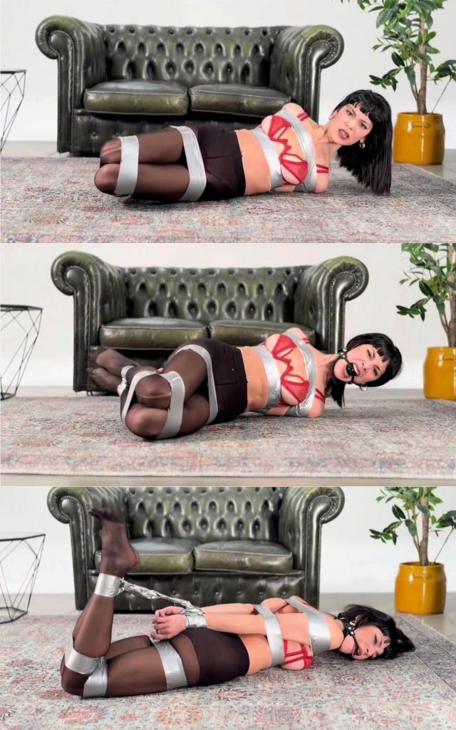Mayla is framed and tied up by Robert in a tape-hogtie POV Mayla Production<br><br>Robert convinces Mayla to be tied up for an escape challenge, Mayla is thrilled by the idea and agrees, but after a while of being tied up tight in a tape-hogtie she realizes that freeing herself will be impossible for her so she starts to suplicate Robert to be untied but he decides to gag her and leave her there to struggle alone.....