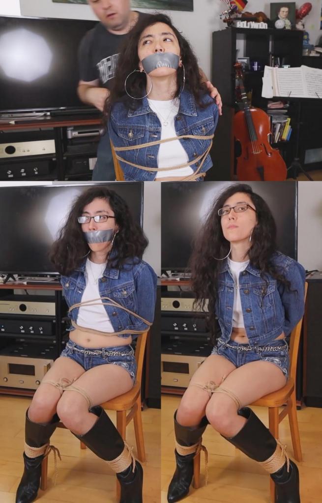 Rockstar Khrystal Discovers a Criminal Operation During a Music Video Shoot… and Ends Up Captured, t Rockstar Khrystal Discovers a Criminal Operation During a Music Video Shoot… and Ends Up Captured, tied and gagged!克里斯塔尔是一位摇滚音乐人，受聘为一家小型汽水公司拍摄广告。她正在片场与导演一起，这位怪异的导演让她用电吉他弹奏几首曲子。克里斯塔尔身着一套性感的80年代风格服装。当导演暂时离开片场时，克莉丝塔尔顺手查看了就在那里的导演笔记本电脑，想找找刚才拍摄的素材，确认自己弹奏的和弦是否正确。令她惊讶的是，她发现了一份文件，其中有证据表明这家汽水公司不过是犯罪组织的幌子。克莉丝塔尔还没来得及离开，就被坏人抓住了，他用绳子把她紧紧地绑在椅子上。克莉丝塔尔试图抗议，却被反复塞上手捂嘴塞堵住嘴。最后，她被胶带封住了嘴。在挣扎和屈辱中，克莉丝塔尔试图逃脱，但绳子绑得太紧了Khrystal is a rock musician who has been hired to shoot a commercial for a small soda company. She is in set with the director, some weird guy who asks her to play some songs in her electric guitar. Khrystal is wearing a hot 80's style outfit. When the director leaves the set for a second, Khrystal takes a look to his laptop that is right there, looking for the footage they just filmed to make sure she played all the right chords. For her surprise there is a document with evidence that the soda company is nothing but a cover for a criminal organization. Before Khrystal can leave, she gets captured by the bad guy, who ties her up tightly to a chair with rope. Khrystal complains but gets silenced repeatedly with handgags. Finally she gets tape gagged. Struggling and humiliated, Khrystal tries to escape, but the ropes are too tight!