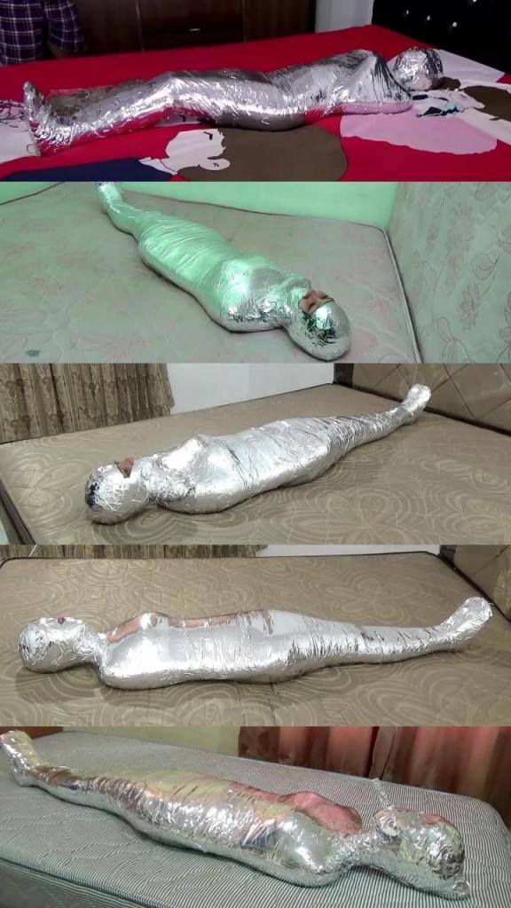 Compilation Ver.15 : Chrome Tape (5 in 1) Compilation Ver.15 : Chrome Tape Mummification is collection of mummification videos from Randy Mummify Editor's Choice, All videos start from the Main Scene (POV)<br>5 Scenes In Compilation : RM068, RM112, RM118, RM119 and RM121