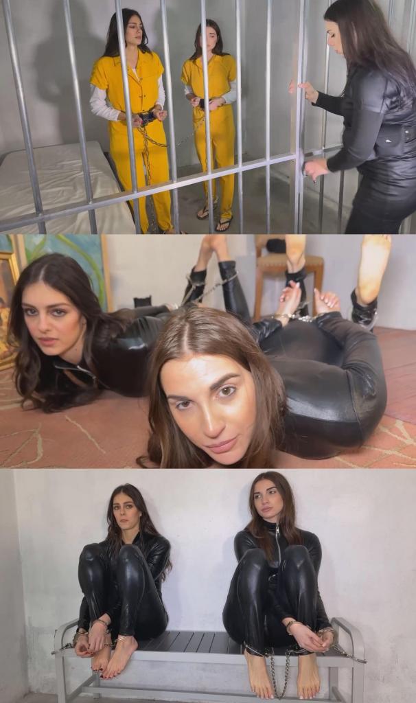 Gaia and Charlotte wonderful thieves in shackles 盖亚和夏洛特是两名因盗窃公寓而被捕的窃贼。<br><br>她们戴着巴拉克拉法帽，身穿黑色乳胶紧身衣。<br><br>一名女警逮捕她们时，用手铐和脚镣将她们赤脚捆绑起来，呈猪蹄式。<br><br>她们挣扎了很久才被扶起来，准备带回警局。<br><br>她们现在赤着脚，戴着手铐和脚镣，被绑在警局的长椅上。<br><br>盖亚和夏洛特完成监狱登记手续后，被套上了黄色连体囚服、手铐、黑色箱子、脚镣、腰链、连接链，以及另一条连接链，将她们锁在一起，形成一个链式手铐。<br><br>然后，她们被押往牢房。<br><br>另外两名“杰出”的窃贼也在监狱里……Gaia and Charlotte are thieves arrested during stealing an appartament.<br>They are in balaclava and black latex catsuit.<br>When a police woman arrests them they are handcuffed and shackled barefoot by handcuffs and legirons in hogtie or hogcuff position.<br>They struggles a lot before coming back in stand up position for going to polcie office.<br>They are handcuffed and shacked now on police bench Always barefoot.<br>Then after jail booking procedures for Gaia and Charlotte there are one piece yellow jumpsuit, handcuffs, black box, legirons, waist chain, connector chain and another connector chain for chained them together in a chian gang.<br>Then arm holding they walk to their cell.<br>Other two wonderful thieves in jail ...