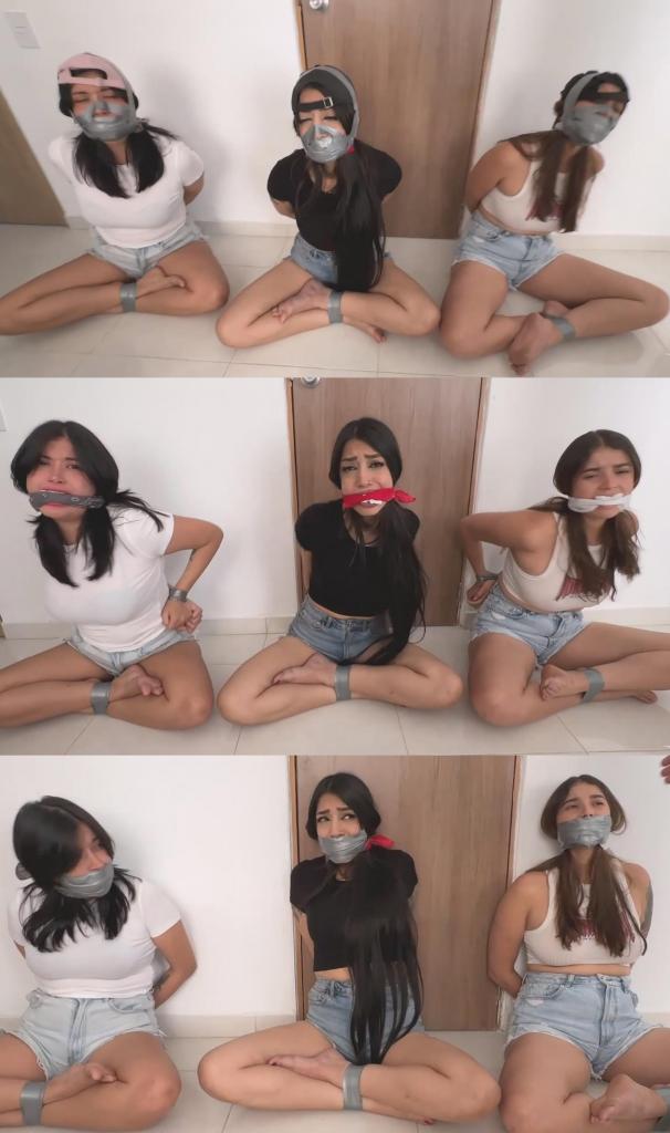 Three PVC Tape Bound Girls Gagfest (Sitting, Jean Shorts, Tshirt, Barefoot, Sock Stuffing, Bandana C Three PVC Tape Bound Girls Gagfest (Sitting, Jean Shorts, Tshirt, Barefoot, Sock Stuffing, Bandana CleaveGag, TapeGag, Tape Mask, WrapGag, Cap, Taped Cap, OnScreen UnGag)女孩们的嘴里先塞进一只白袜子，然后用头巾堵住嘴。接着，她们的嘴上会被缠上一些PVC胶带。之后，在她们的下巴下方贴上胶带，再在鼻子上方贴一小块胶带，最后用胶带把鼻子完全包住，做成一个面具。<br><br>展示一下你下巴下方的胶带！为了展示胶带有多紧，女孩们会撅起嘴巴。为了彻底堵住嘴，封嘴的人会拿一顶帽子，用胶带绕在她们的脖子后面，做成一个缠绕式封嘴，然后再把帽子绕在她们的下巴下方，盖住帽子。最后，你要展示一下整个解封过程！The girls are mouth stuffed with a white sock to then be cleavegagged with bandanas. Then they will get some PVC tape strips over the cleave gag. After add tape under their chin, add a small piece over their nose, and cover it with tape to make a mask<br><br><br>Show the tape under your chin! To show how tight the tape is, girls purse their lips underneath their gag. To top off the gag, The gagger grab a cap, wrap the tape behind their necks for a wrap gag, and then wraps the cap under their chins and over the Cap. When it’s done you show the ungagging process of everything!