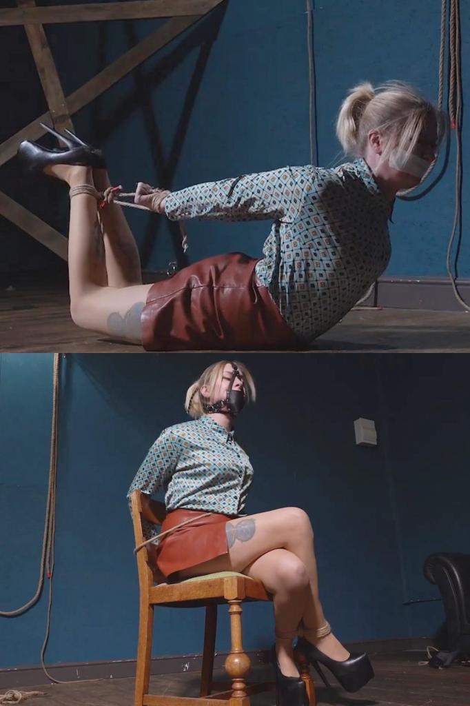 5374 Amber in Blouse Bondage Double 艾梅柏遇到麻烦了。她穿着衬衫、裙子和高跟鞋，被绑在椅子上，嘴里塞着一块吓人的口塞。她在椅子上挣扎了一会儿，然后被拉下来放到坚硬的地板上，并被紧紧地捆绑起来。口塞被换成了微孔泡沫胶带。她继续挣扎。Amber is in trouble. already tied to a chair in her blouse and skirt with heels, she is gagged with a menacing panel gag. After struggling in the chair she is removed and put to the hard floor and hogtied tightly. The gag is exchanged for some microfoam tape. More struggling.