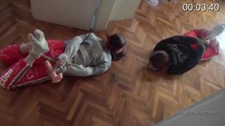 CRAWLING HOGTIE Christina and Ally are on the floor, hogtied and ready to go. The challenge is to crawl to end of the living room, grab the dildo and crawl back. The struggle is real, and mumbling gagtalk all the way, who`s gonna win ? ;)<br>Clip last for : 09.29 min