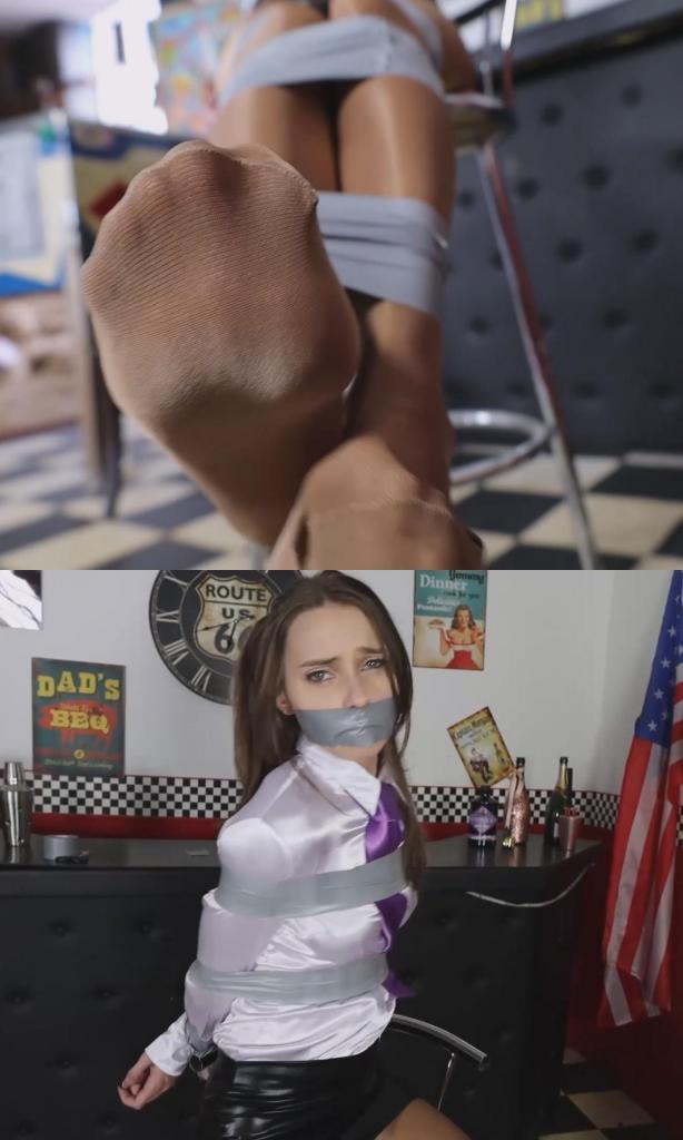 MADE IN ENGLAND! MI5 agent Chloe Toy ruins an undercover mission and has to be tied up and gagged to MADE IN ENGLAND! MI5 agent Chloe Toy ruins an undercover mission and has to be tied up and gagged to protect her and the mission克洛伊·托伊是军情五处的新晋特工。此前她一直在内勤部门工作，但晋升为外勤特工后，她终于接到了第一个任务。<br><br>克洛伊循着情报，追踪到一个在伦敦活动的大型犯罪组织的总部，而这个总部竟然藏身于一家看似普通的地下酒吧。酒吧外表看似无害，实则隐藏着该团伙的秘密行动基地。<br><br>调查过程中，克洛伊遇到了一个她一眼就认出的男人——也是一名军情五处特工！她松了口气，听他简要地解释了情况。原来他已经卧底数月，逐步赢得了犯罪分子的信任，并接近了他们行踪诡秘的首领。行动即将成功，组织头目随时可能出现。<br><br>然而，克洛伊的意外出现却有可能毁掉一切。<br><br>如果犯罪分子发现有另一名军情五处特工在暗中调查，那么多年的努力可能付诸东流，整个行动可能彻底失败，克洛伊本人也可能身陷险境。<br><br>卧底特工急中生智，提出了一个解决方案。他要伪装成已经抓住了克洛伊。如果那伙人赶到时发现她被牢牢地捆绑着，他们就会相信他仍然忠于他们。这个计划有三个关键目的：保护克洛伊、确保行动顺利进行，以及加强他在组织内部的掩护。<br><br>克洛伊意识到没有更好的办法了。她或许不喜欢被捆绑几个小时，无法解释自己的身份，但让罪犯发现她会更糟。<br><br>她勉强同意了。<br><br>卧底特工迅速将她的手腕反绑在背后，然后捆绑了她的手臂、身体和腿，力求让捆绑看起来尽可能逼真。克洛伊抗议说捆绑得有点紧，但他坚持认为，要想成功，逼真至关重要。<br><br>最后，他用口塞堵住了她的嘴，让她无法发出抗议，确保伪装彻底完成。<br><br>克洛伊现在看起来完全像个被俘的特工，卧底特工开始做最后的准备。罪犯随时可能出现，他必须让他们相信一切尽在掌握。<br><br>他的计划会成功吗？还是两名特工都会暴露身份？<br><br>未完待续……<br><br>包含幕后花絮！Chloe Toy is a rookie MI5 agent. Until recently, she worked behind a desk, but after earning a promotion to field operative, she has finally been assigned her very first mission.<br><br>Following a trail of intelligence, Chloe tracks the headquarters of a major criminal organization operating in London to what appears to be an ordinary underground pub. Behind its innocent facade lies the gang's secret base of operations.<br><br>As she investigates, Chloe encounters a man she immediately recognizes—another MI5 agent! Relieved, she listens as he quickly explains the situation. He has been working undercover for months, slowly earning the trust of the criminals and getting closer to their elusive leader. The operation is on the verge of success, and the organization's boss is expected to arrive at any moment.<br><br>But Chloe's unexpected appearance threatens to destroy everything.<br><br>If the criminals discover another MI5 agent snooping around, years of work could be lost, the entire operation could collapse, and Chloe herself could be in serious danger.<br><br>Thinking fast, the undercover agent proposes a solution. He will make it appear that he has already captured Chloe. If the gang arrives to find her securely restrained, they will believe he remains loyal to them. The plan serves three crucial purposes: it protects Chloe, preserves the operation, and strengthens his cover within the organization.<br><br>Chloe realizes there is no better option. She may not like the idea of spending hours bound and unable to explain herself, but allowing the criminals to discover her would be far worse.<br><br>She reluctantly agrees.<br><br>The undercover agent quickly secures her wrists behind her back, then binds her arms, body, and legs, making the restraints look as convincing as possible. Chloe protests that the bindings feel a little too tight, but he insists that realism is essential if the deception is going to work.<br><br>Finally, he places a gag over her mouth, silencing her protests and ensuring the disguise is complete.<br><br>With Chloe now looking every bit the captured agent, the undercover operative makes his final preparations. The criminals will arrive any minute, and he must convince them that everything is under control.<br><br>Will his plan work, or will both agents be exposed?<br><br>To be continued...<br><br>Includes behind-the-scenes footage!