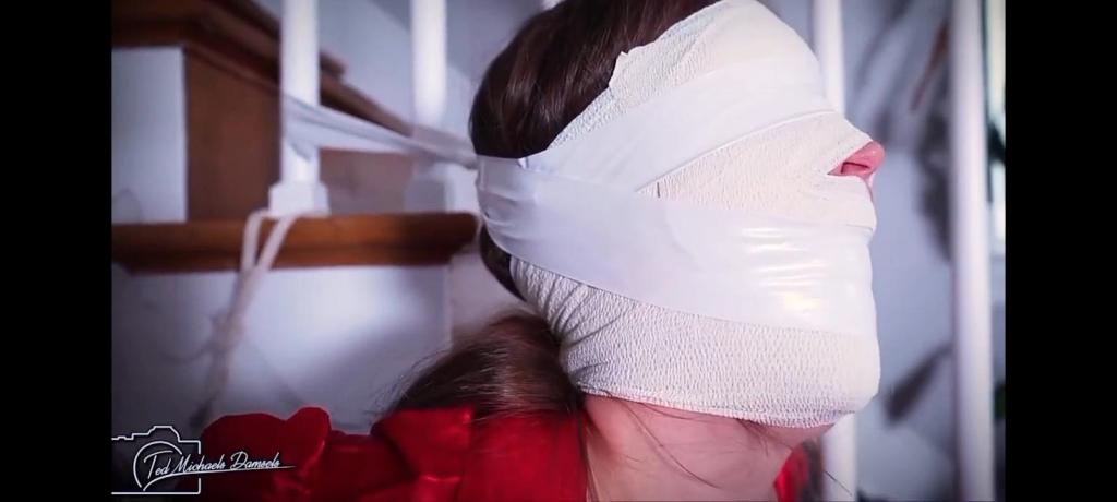 Boss Lady in Bondage - She Demanded Attention and Ended up Crushed in Restraint with Her Tits Taped, Boss Lady in Bondage - She Demanded Attention and Ended up Crushed in Restraint with Her Tits Taped, Panties Down and Lips Wrapped Around a Mouthful of Shut the Fuck Up with Rachel Adams - 720<br><br> the mob boss' wife struggled in crushing and inescapable restraint. In complete agony she writhed in her strict bondage, moaning into a cruel muffling of a ballgag strapped deeply into her mouth and then crushed in place with tight gauze wrapped over her lower face and eyes. Her tongue brushed the inside of the spherical phallus plugging her mouth, her bemoaning of, "Oh, god" communicating fully just how fucked she was by her restraint. Her elbows were crushed together behind her back, her wrists were raised high into the air, tape welded her both to a chair and into complete helplessness, and she could barely move as she struggled uselessly<br>She only wanted her husband's attention, and her scheme was to get it with pictures of her bound and helpless. His business was binding and gagging women, and he worked long hours. If she wanted him to spend more time at home, she needed to show him the bitch needing to be bound was the one next to him in bed. She recruited his partner to help her, knowing he could bind her properly, but he had his own motives.<br>The sound of tape coming off of the roll filled the room as he taped her legs, her elbows and then her chest until her breasts bulged painfully. Now, with her mouth stuffed and gauze over her face, she could only moan and wiggle. He just watched, reveling in her discomfort as she struggled for him and him alone. Every bit of her agony was for him as she punished herself with her own struggles. Finally, he taped her face as she groaned. If she wanted this to work, she'd have to suffer just as much as the women that worked with her husband. And those women got worked hard!<br><br>