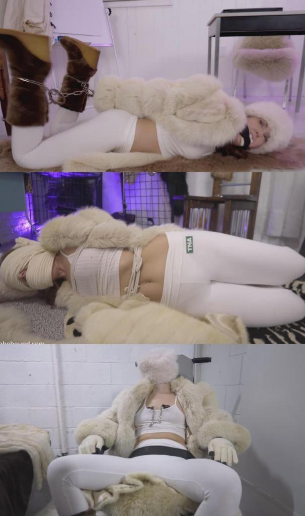 Cream fur Kingdom vs black fur kingdom. Who sent you Cream???? starring Rachel Adams 奶油色皮毛王国和黑色皮毛王国长期以来一直互相敌视。近年来，双方都保持着沉默，没有过往的接触。今天，奶油色皮毛的瑞秋·亚当斯出现在监控录像中，她完美地出现在奶油色皮毛王国的总部附近，并透过窗户向外窥视。黑色皮毛的JJ难以置信地看着这一切，轻而易举地缴了瑞秋的械，并给她戴上了手铐。JJ搜查了瑞秋的身，询问了一些问题，然后用口塞堵住了她的嘴，并用乳头套堵住了她的头。尽管瑞秋是被她的族人设局陷害的，但她仍然拒绝开口。瑞秋仍然不停地挣扎，于是很快被带到牢房，绑在束缚椅上，乳头被夹住。她奋力反抗，但最终还是被黑色皮毛的JJ制服了。接下来，镜头切换到瑞秋被铐在束缚椅上，置于一个狭小的地牢中，嘴里塞着球形口塞。过了一会儿，她的手铐被解开，用绳子捆绑起来，嘴里塞着口塞，乳头再次被夹住。最后，她被五花大绑地绑在地上。塞住瑞秋嘴的布条很快被取下，有人用勺子喂她吃了一些泔水，然后她的嘴又被塞了起来。布料蒙住了她的嘴和眼睛。她将会面临怎样的命运？The cream fur kingdom and the black fur kingdom have disliked each other for a very long time. In recent years things have been quiet without one approaching the others kingdom. This day cream fur Rachel Adams appears lucking picture perfect on security cameras, wandering around and peering in a window at cream fur headquarters. Black fur JJ watches in disbelief and easily disarms and cuffs up the beautiful visitor from a far away land. She frisks her, she asks questions she stuffs her mouth and wraps her head with a cleave gag. She refuses to talk even though her people sent her into a trap.  Still sooo much movement so she is soon taken to a cell and placed into a restraint chair and nipple clamped. She has a lot of fight in her but black fur eventually silences her. Next cream fur Rachel is shown restrained to a bondage chair with cuffs in a small dungeon and ballgagged after a while she is uncuffed and tied with rope, cleave gagged and then nipple clamped again. She is hogtied on the floor. The gag is soon removed and Rachel is spoon fed some slop before having her mouth stuffed again. Fabric is wrapped around her mouth and her eyes. What will become of her?