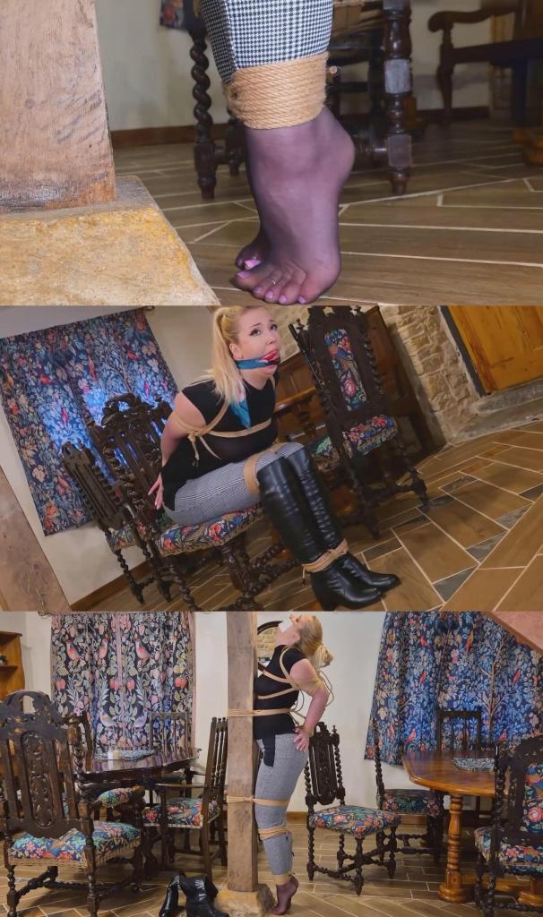 Lil Missy UK in Rider Missy In Super Tight Uncomfortable Post Tie 米西以为自己独自一人，准备沉浸在一段私密的骑马幻想中。她精心打扮，身着一套紧身贴合的骑装，自信地走进房间。她绕着她的“骏马”——一匹经典的木制摇椅——转了一圈，脸上带着一丝俏皮的微笑，仔细地打量了一番，然后才翻身上马。她弓着背，扭动着臀部，开始练习骑乘，完全沉浸在自己天真又略带情色的乐趣世界里。木头发出有节奏的吱嘎声，回荡在房间里，她也沉浸在自己的幻想中。<br><br>然而，她的秘密骑行却戛然而止。一个闯入者突然闯了进来，在她骑乘的瞬间将她拦住。米西脸上震惊和羞辱的表情令人难忘，她僵住了，双颊绯红。她的私人表演瞬间变成了公开的闹剧，而闯入者显然没有放过她的意思。<br><br>画面一转，幻想变成了残酷的现实。米西被紧紧地绑在一把木椅上，像个无助的少女，在她自己的家中。紧绷的胸带束缚着她的上半身，双手被反绑在背后，脚踝和膝盖也被坚硬的绳索捆绑在一起。一条丝滑的缎面围巾被塞进她的嘴里，形成一个粗暴的口塞，让她只能发出绝望而压抑的呻吟。她扭动挣扎，双腿徒劳地摩擦着，试图挣脱束缚，但每一个绳结都牢牢地固定着。她完全受制于这个陌生人。<br><br>折磨愈演愈烈。在最后一个场景中，米西被移到房间中央，面对着一根粗壮而坚硬的木柱。她现在就像一件艺术品，被摆放在显眼的位置，踮起脚尖，展示着穿着黑色丝袜的双脚优美的曲线。她的膝盖和腰部被紧紧地绑在木柱上，身体与木头融为一体。在一场残酷的束缚展示中，她的头发被猛地向后拽，固定在手肘的绑带上，将她的头拉成一个痛苦的弓形。一条紧紧的微孔泡沫胶带封住了她的嘴，让她可怜的呜咽声几乎消失殆尽。她在这令人痛苦不堪的束缚姿势中挣扎，每一块肌肉都绷紧，身体几乎无法动弹，更别说逃脱了。这简直是完美无缺、令人绝望的束缚。Missy thought she was alone, ready to indulge in a little private equestrian fantasy. Dressed to impress in a tight, form-fitting rider outfit, she struts confidently into the room. She circles her noble steed – a classic wooden rocking – with a playful smirk, giving it a thorough inspection before mounting it. With her back arched and hips rocking, she begins to practise her riding, completely lost in her own world of innocent, kinky fun. The rhythmic creaking of the wood fills the room as she’s lost in her fantasy.<br><br>But her secret ride is cut devastatingly short. An intruder bursts in, catching her mid-stride. The shock and sheer humiliation on Missy’s face is priceless as she freezes, her cheeks flushing. Her private show just became a very public spectacle, and the intruder has no intention of letting her off easy.<br><br>The scene cuts, and the fantasy has soured into a strict reality. Missy is now bound tightly on a wooden chair, a helpless damsel in her own home. A tight chest harness pins her upper body, her hands are wrenched behind her back, and her ankles and knees are lashed together with unyielding rope. A silky satin scarf is pulled deep between her lips in a harsh cleave gag, reducing her protests to desperate, muffled moans. She squirms and struggles, her legs rubbing together uselessly as she tests her stringent bondage, but every knot holds firm. She’s completely at the mercy of this stranger.<br><br>The torment escalates. In the final scene, Missy is relocated to the center of the room, facing a thick, unforgiving wooden pole. She’s now a piece of art on display, stretched onto her tip-toes, showing off the elegant curve of her dark pantyhose-clad feet. Her knees and waist are cinched snugly to the pole, fusing her body to the wood. In a cruel display of strict bondage, her hair is yanked back and secured to her elbow ties, pulling her head back into a painful arch. A tight strip of microfoam tape seals her mouth, muffling her pitiful whimpers into near silence. She struggles in this excruciatingly tight and uncomfortable position, every muscle straining, her body barely able to twitch, let alone escape. This is pure, hopeless bondage perfection.