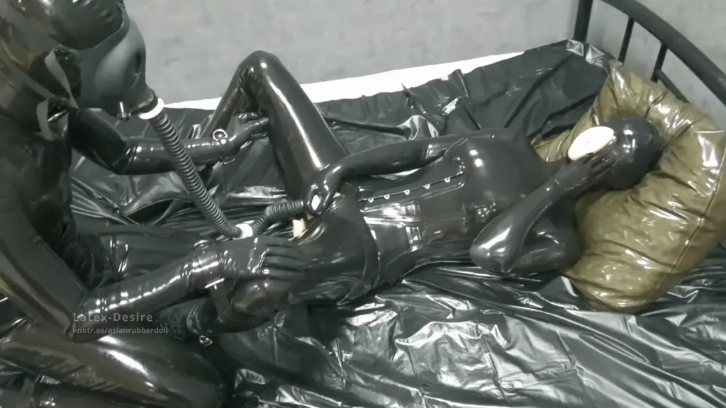 Sniffing dildo & rubber pussy I: Little rubber doll Ruby and slave P. have fun with the sniffing dildo ? What is it like to breathe in the hot smell of the rubber pussy?