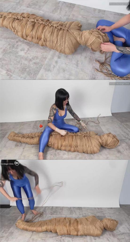 Hemp Mummy Bondage 片名：Hemp Mummy Bondage<br><br>这个是男M片，请喜欢此类的朋友购买，谢谢<br><br>Hinako has obtained a new hemp ribbon with a uniquely prickly texture.<br>Using it, she slowly wraps your entire body, turning you into a tightly bound hemp cocoon.<br>To ensure you can’t escape, she reinforces the wrapping with a full-body rope tie, securing every movement until you are completely under her control.<br>Once you’re fully immobilized, Hinako straddles your helpless body.<br>Wearing medical gloves, she teases you with precise, deliberate edging—cold latex against your skin, her weight pinning you down, and no way to resist or escape her rhythm.<br>This session is captured from a fixed camera angle, letting you savor every moment of her controlled pace and the immersive helplessness of total restraint.<br><br>Hinako获得了一条质地独特且带刺的新型麻质丝带。<br>使用它，它会慢慢包裹你的全身，把你变成一个紧紧捆绑的麻布茧。<br>为了确保你无法逃脱，她用一条全身束缚带加固包裹，限制你的每一个动作，直到你完全处于她的控制之下。<br>一旦你完全动弹不得，Hinako就会跨坐在你无助的身体上。<br>她戴着医用手套，用精准而从容的技巧挑逗你——冰凉的乳胶贴着你的肌肤，她的身体压着你，让你无法抗拒或逃脱她的节奏。<br>本片段是从固定摄像机角度拍摄的，让你能够细细品味她控制节奏的每一刻，以及完全克制所带来的身临其境的无助感。