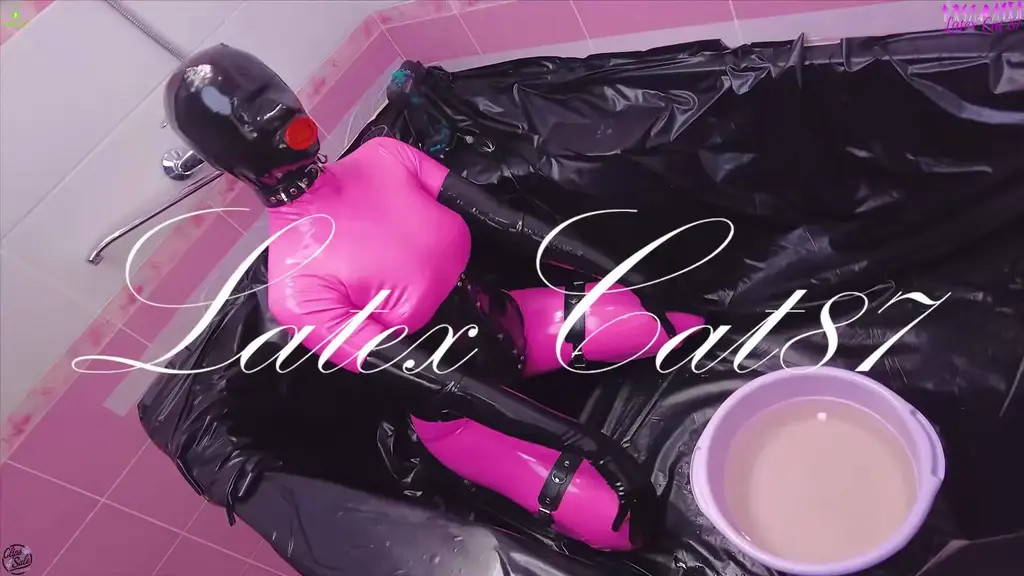 Sex with a rubber doll in a bath full of lube The latex-clad rubber dolls body glides under the thick layer of lubricant. She runs her hands over her breasts, her nipples straining under the shiny fabric. Oh, how divine this slippery lubricant feels on my rubber skin. Im literally dripping with it. She spreads her thighs, caressing herself through the thin latex. Her rubber pussy is aroused, the sensation of the lubricant driving her crazy. Mmm, and I feel it seeping, making everything especially sensitive. I need you here with me right now, slave. I want to slide on this hard cock. Her slave enters the bathtub, drawn by the seductive figure of his Mistress. She beckons him closer with her finger, bending him against her slippery body. Come here and let me wrap myself around you. He straddles her, his cock jutting toward her face. She reaches up to stroke him with her slippery gloves, smearing lube all over his shaft. Ah, so big and hard for me. I bet you like seeing me so lubed up, dont you, slave? She strokes him faster, the slippery latex providing delicious friction. Mmm, I want to taste you. I could suck this cock all day. She takes him into her mouth, bobbing her head up and down his length. She needs that big cock inside her. Fuck me the way you want, slave. Put that cock inside my rubber cunt! He complies. She gasps at the feeling of being stretched so completely, the lube easing his passage. The sound of wet flesh slapping against flesh echoes throughout the bathroom, punctuated by their mutual moans of pleasure.