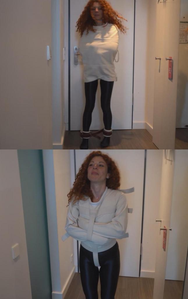 PSJ-2026-LO-03 Lola Montez In Straitjacket And Transport Jacket 把一个脾气火爆的西班牙红发女孩塞进束缚衣里，就像用水来灭火一样。我就是这样对萝拉·蒙特兹做的，她对束缚衣的世界还很陌生。首先，她穿上了一件波西式束缚衣，还戴上了皮质腿套，让她动弹不得。我们看到她在帆布上挣扎，但很快，她又穿上了一件我称之为“精神病院斗篷”或“波西式运输服”的东西，让她更加安全。她奋力反抗，挣扎着想要摆脱束缚，看起来非常性感，你甚至能听到帆布摩擦的沙沙声，但她最终能找到出路吗？屏幕上呈现束缚过程。Putting a feisty spanish read head into a straitjacket is like containing fire with water. And thats what I did with Lola Montez, who is new to the world of straitjackets. First she gets a Posey style Straitjacket and leather leg restraints to keep her helpless. We watch her struggling against the canvas but soon she gets a asylum poncho - as I call it or a Posey transport jacket to make her even more secure. She puts up a good fight and looks so good fighting that institution gear and you can hear some good canvas ASMR, but will she find a way out? Onscreen Strapping.