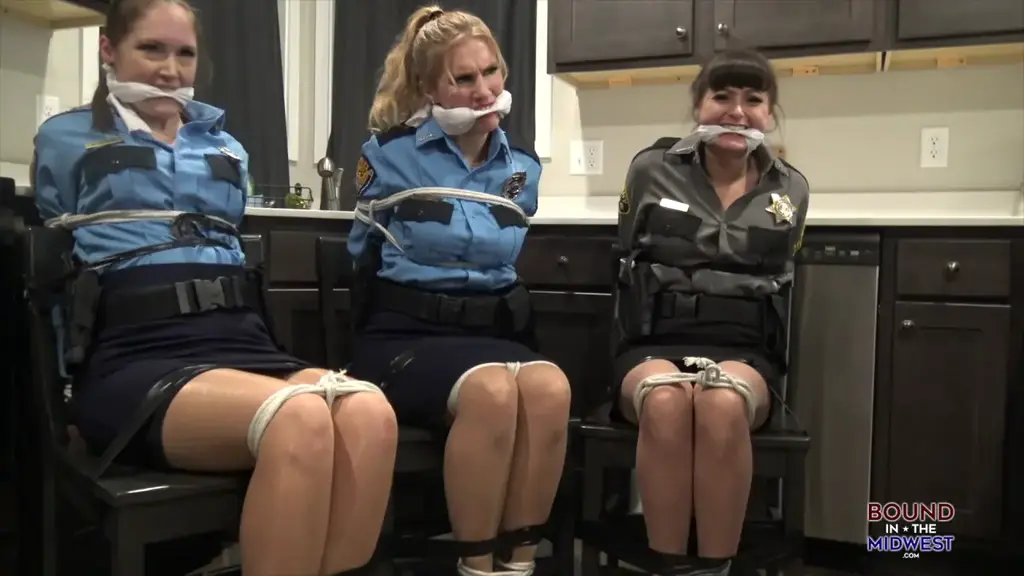 Unlawful Invasion Security guard Lilmizzunique comes home to be grabbed and tied up and gagged. Her roommates, Police officers Blair and Rachel, come home to find her tied up. He makes Rachel bind and gag blair and to tie herself up and he finishes the job. Join us as he moves each girl to different rooms and enjoys tying them up.