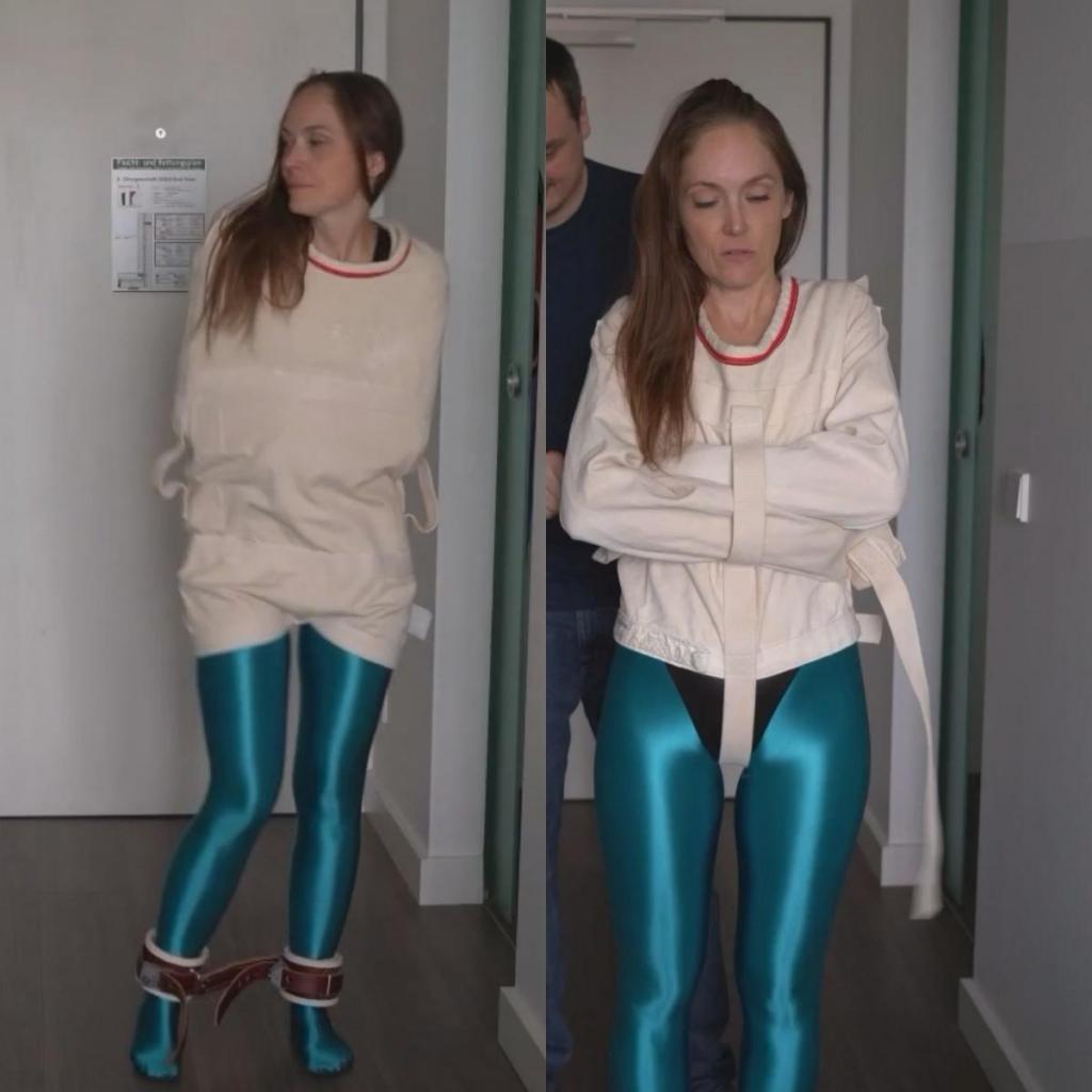 PSJ-2026-RA-03 Rachel Adams Gets The Full Posey Asylum Package 可爱的瑞秋·亚当斯穿着紧身衣和闪亮的连裤袜。她从美国给我带来了一件波西（Posey）束缚衣，我们当然都同意她必须穿上它（当然了），来测试一下。合身吗？牢固吗？在给她穿上束缚衣的过程中，我们聊了很多关于束缚衣的知识——毕竟我们是专家。很快，瑞秋就完全动弹不得了，我们给她戴上了人道约束（Humane Restraint）的腿部束缚带。她开始拼命挣扎，使劲反抗波西束缚衣，表演精彩（声音也很大）。但几分钟后，我觉得她需要再加一层帆布，于是给她穿上了一件波西运输服，盖住了她已经无力反抗的身体。她继续挣扎，试图挣脱，但成功了吗？屏幕上是束缚衣的穿戴/解开过程。Cute Rachel Adams is wearing a leotard and some shiny pantyhose. She brought me a Posey straitacket from the states and of course we both agreed on that she has to wear it (of course), to test it. How is the fit? Is it secure? While strapping her in, we talk a lot about straitjackets - the experts that we are. Soon Rachel is all helpless and receives Humane Restraint leg restraints. She really fights the Posey straitjacket then, struggles a lot and gives a great show (and sound). But I thought after a few minutes she needed another layer of canvas and covered her already helpless body under a Posey transport jacket. She continues to fight and try to break free, but with success? Onscreen Strapping/Unstrapping.