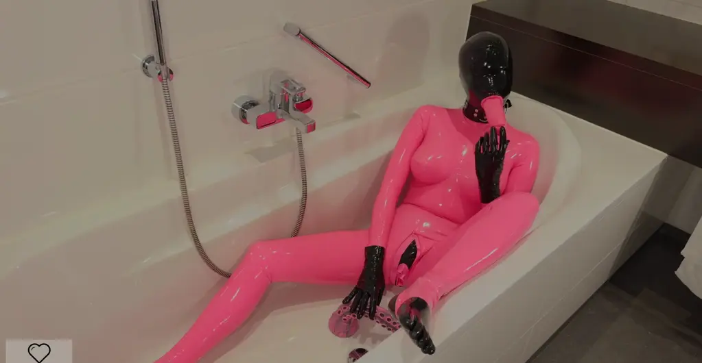 00515 - I can still feel the texture I was in the mood to play with my pretty Nothosaur toy and what better outfit to wear than my bubblegum pink big boob catsuit with black accessories... I started off playing with my condom hood. Then I sucked on the dildo and really tested my gag reflex. I wanted that toy inside of me so I fucked my pussy with it. It has such an amazing texture! Even though my pussy was covered with latex on the inside I could still feel it.<br>#乳胶 #latex #触手