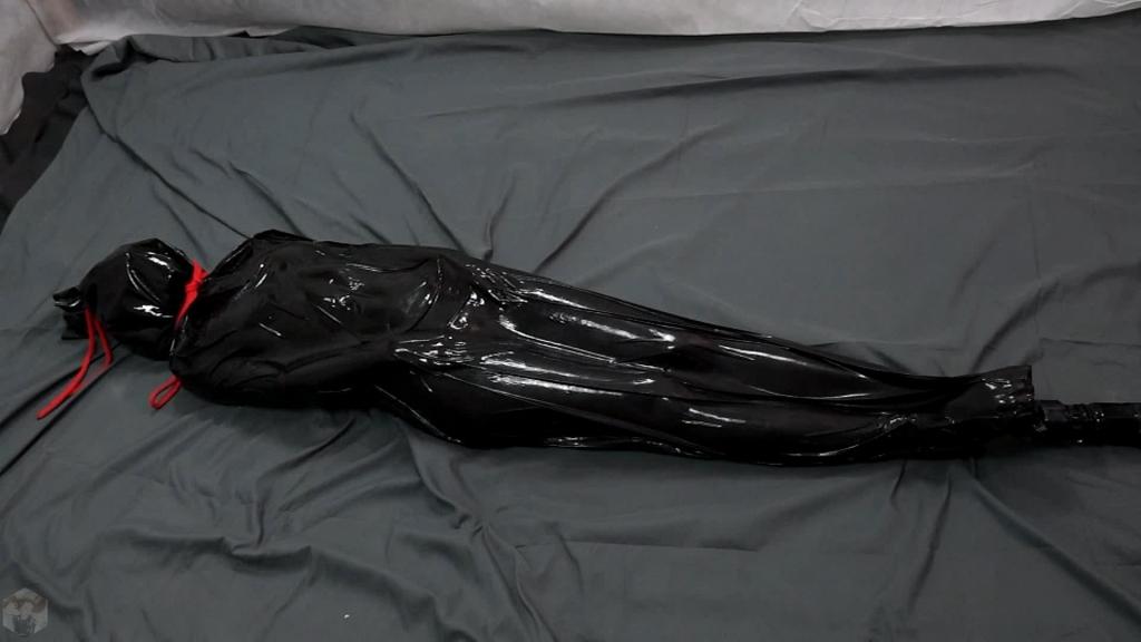 Girl in a black cocoon, bondage Sonya has a new toy. The girl decided to try it out. Sonia liked being in the black shell. She enjoyed the aesthetic pleasure of being inside the black cocoon. The shell tightened and emphasized the lines of Sonia's figure. It was amazing!
