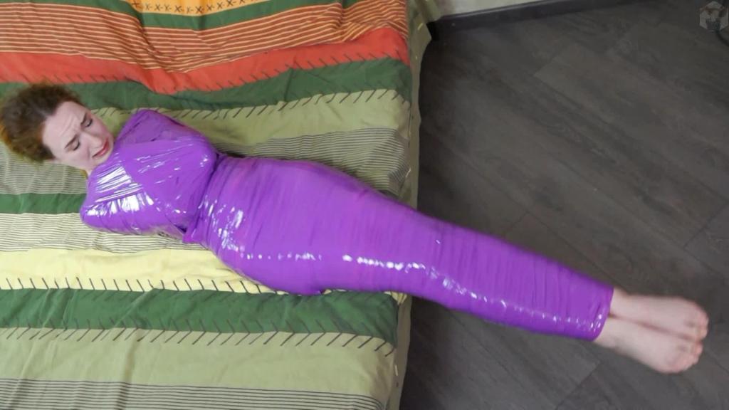 Bondage of Sonya with purple ribbons Wow, what a color. Sonja used bondage tape for new experiments. It's so bright and so sexy around the girl. The duct tape was pulling on Sonia's body, look how she tossed and turned...