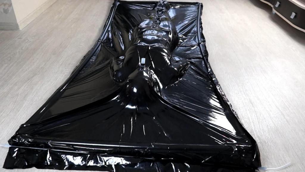 Shibari in a vacuum bed and glowing collar Missed the vacuum beds? Sonja's girlfriend missed them, too. She loved being tied up in it. This time she made a bigger shibari for you to see and wore a glowing collar just for you.