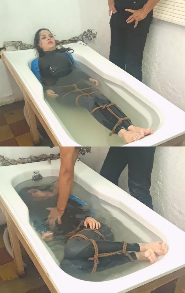 Yessica Bunny Shibari Submissive Apnea Skin Glide CPR End 这是水下浴缸场景，我们用绳索控制耶西卡，让她进行闭气训练，她身上穿着紧身泳衣，纤细的身体与绳索紧密相连。她很紧张，每次闭气只有30秒。她还不适应水中绳索的束缚。我们欣赏她绝望的挣扎，以及她努力集中注意力，直到她过于放松，最终陷入昏厥的过程。在第一部分中，你可以看到几分钟的紧急心肺复苏。敬请欣赏。专业表演。请勿模仿。Here is the underwater bathtub scene, where we subdue Yessica in a rope and apnea session with the beautiful skin glide suit attached to her ultra-thin body. She is nervous and her apneas are only 30 seconds long. She is not yet comfortable in the water with the ropes. We enjoy his desperation and his attempts to concentrate until he becomes too relaxed and goes on a journey into blackout. You can see a few minutes of emergency CPR in this part 1. Enjoy it Professional performance. Do not attempt